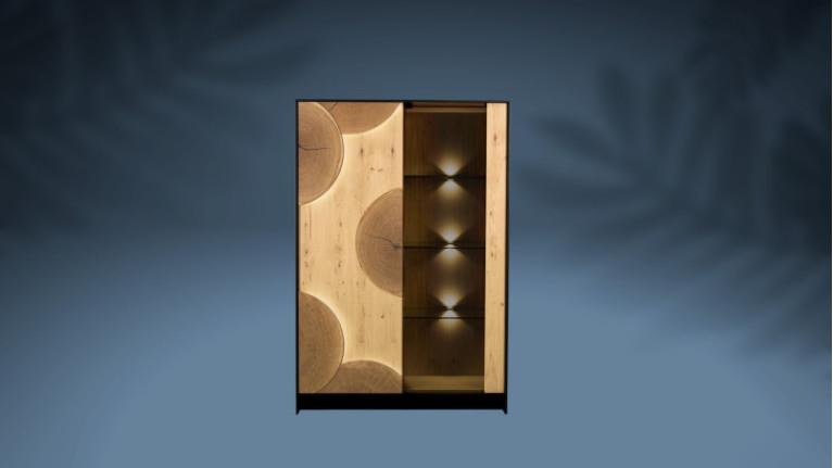 The EQUINOXE 2-door display case is a high-end piece of furniture with integrated lighting.