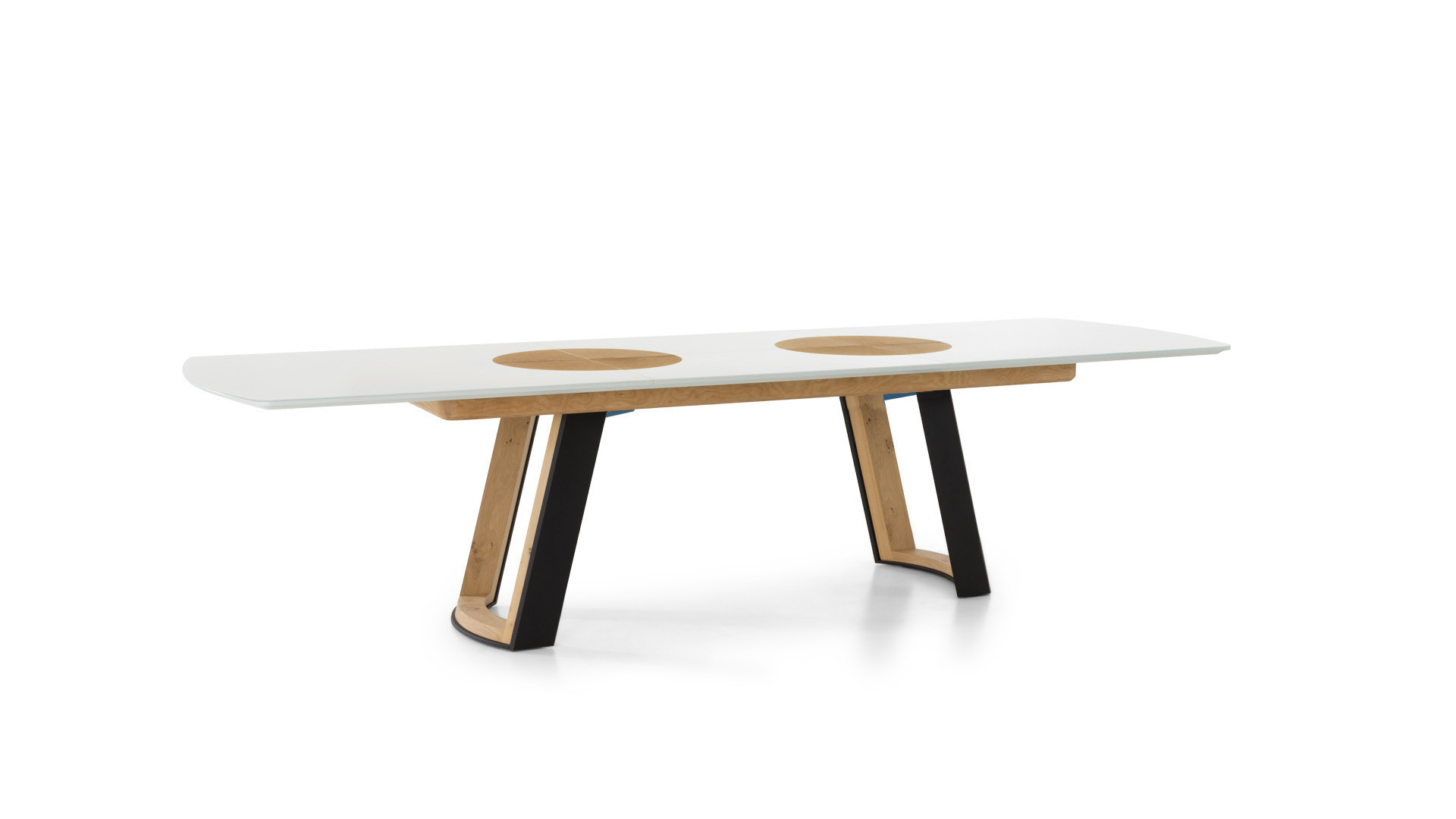 Extendable dining table in AUSTRAL natural oak veneer, lacquer or scratch-resistant ceramic.