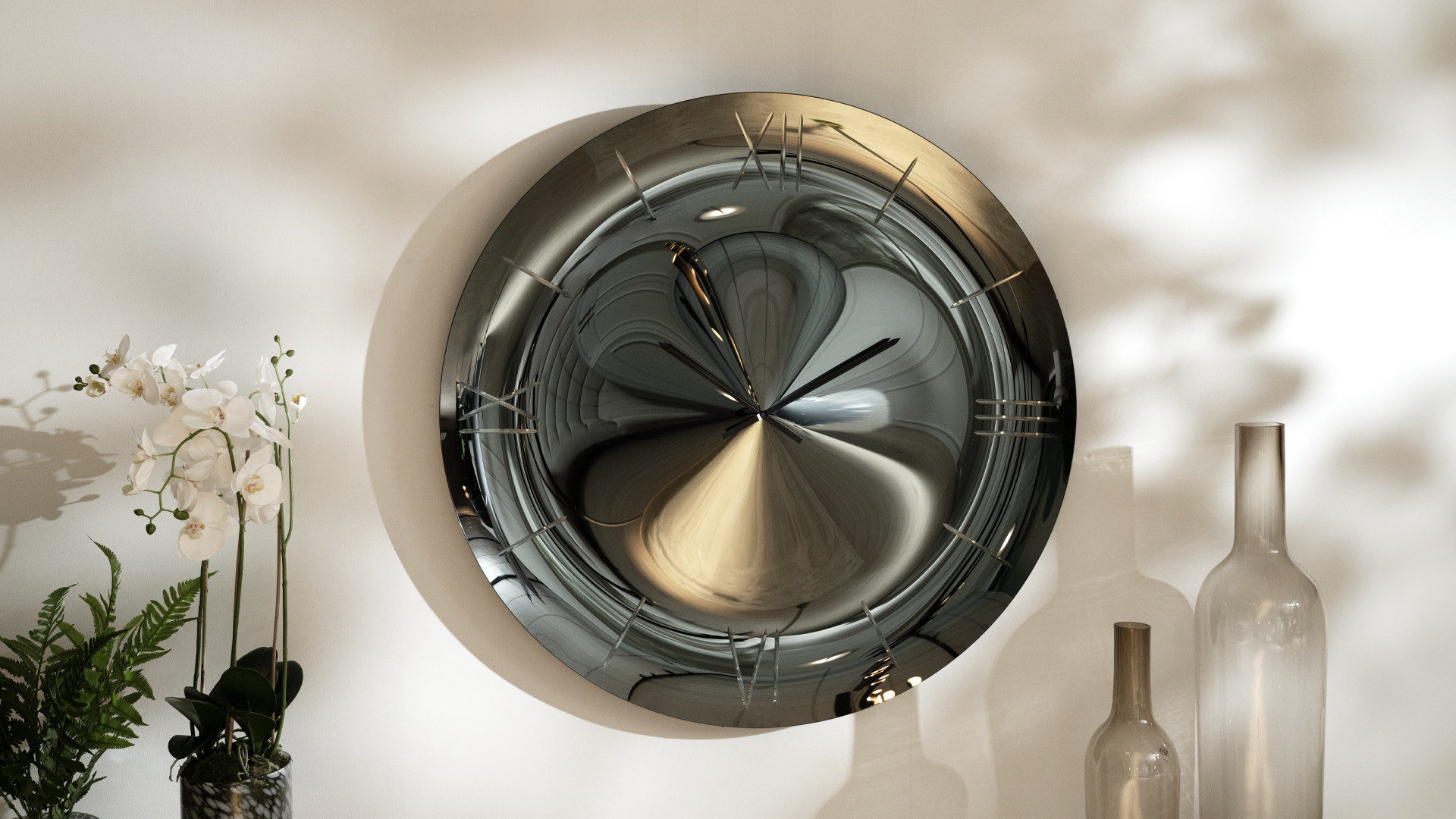 ILLUSION wall mirror clock | Hypnotising